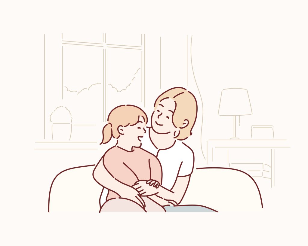 Mother holding daughter.